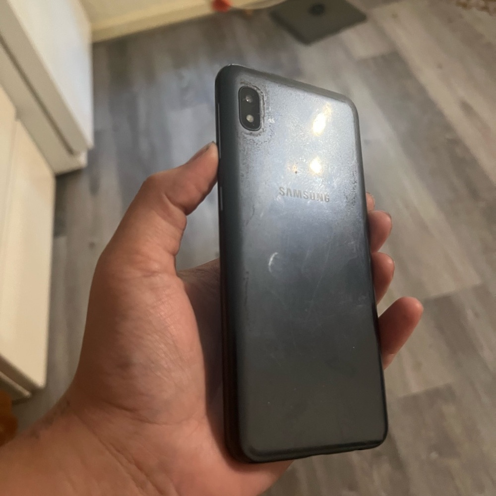 Samsung Black Smartphone with Dual Camera and Curved Design